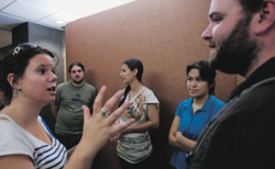 Compassion club supporter Marjolaine Despars talks to club operators Marc Bissonnette (from left), Genevieve Simon, Marianita Hamel, and Alexandre Lapointe at the Montreal courthouse yesterday. Photo by Marcos Townsend